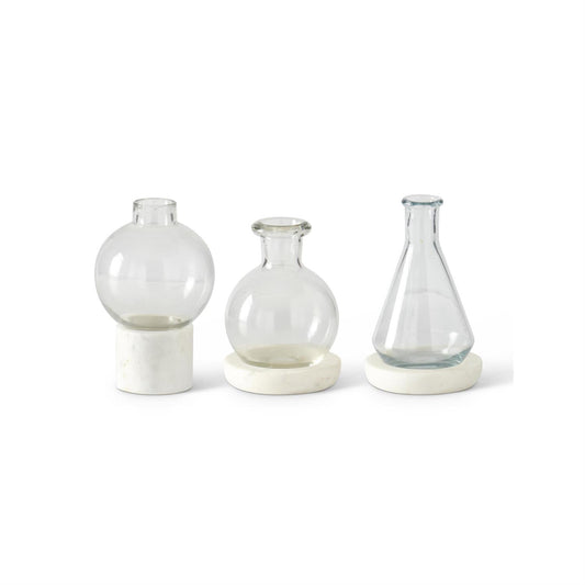 Tall Clear Glass Vases on White Marble Base